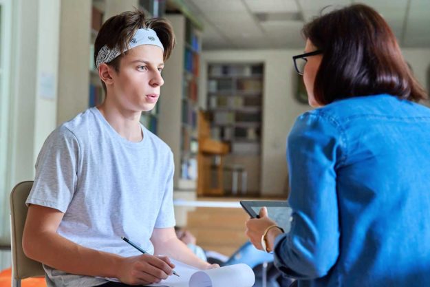 What Is Applied Behavioral Analysis young male and woman talking