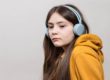 a nonverbal autistic child has her headphones on