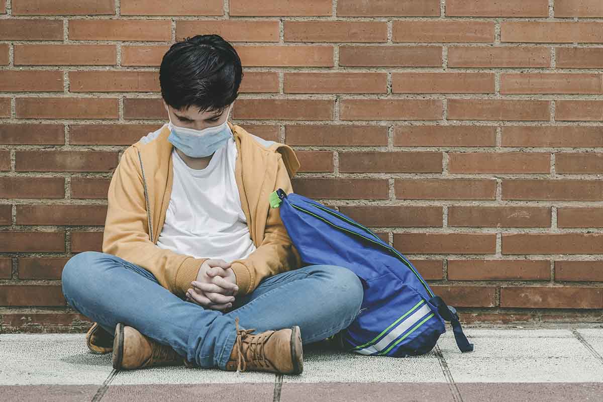 child thinking about autism and coronavirus