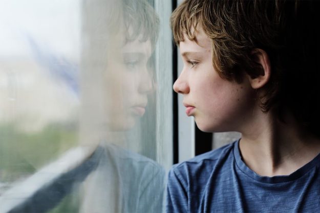 Children-and-Transitions boy thinking about children and transitions