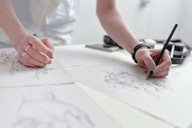 5-How-Art-Can-Help-Your-Child-With-Autism someone practices their art to help with autism