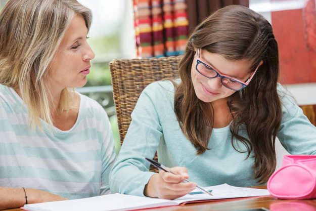 functional skills training ideas for children with autism a mother helps her child with her functional skills training ideas