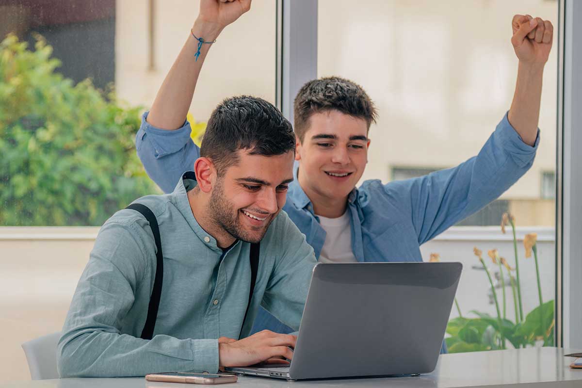 Managing Motivation for Teens With Autism two males looking at a laptop