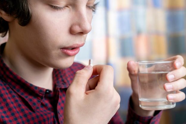 What Sorts of Medications Could Help My Autistic Child_ a child taking medications for autism