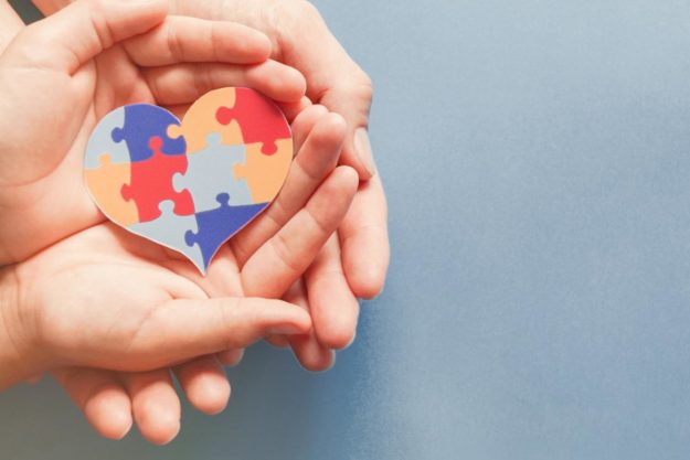 World Autism Awareness Week Starts in March a heart with puzzle piece designs on it representing World Autism Awareness Week