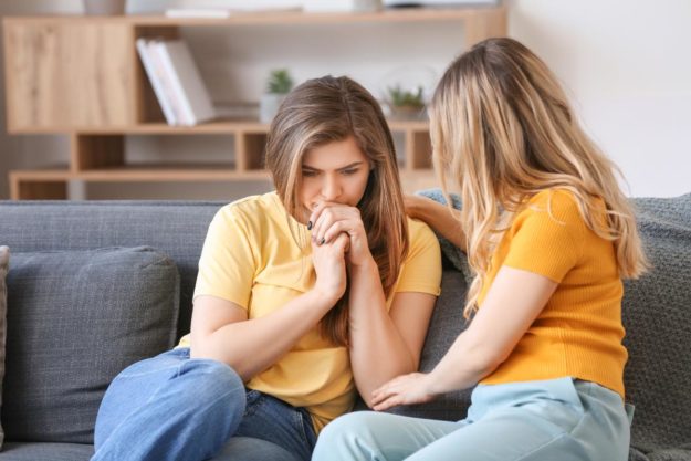 5 Things To Do When Your Child Is Diagnosed With Autism a-teen-talking-with-a-loved-one-about-being-diagnosed-with-autism