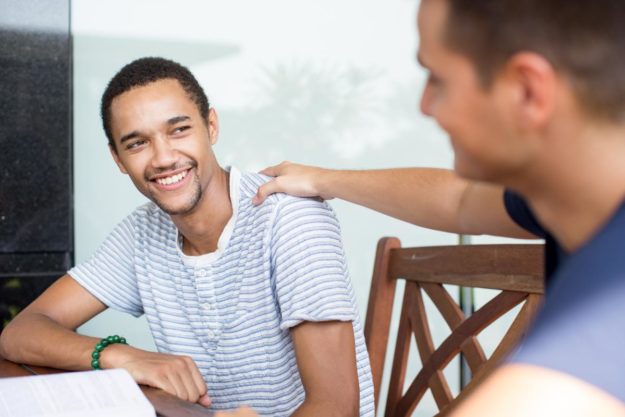 Tips For Improving Social Skills For Children With Autism parent-and-teen-discussing-social-skills-for-children-with-autism