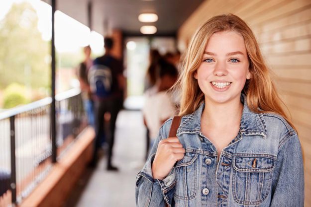 Finding The Right Education Program For ASD in Fort Worth, Texas teen-smiling-at-an-education-program
