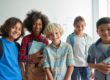 classroom of children with teacher who is using autism awareness resources for schools